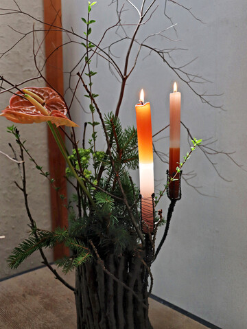 Werden die Kerzen entzündet, treten sie in den Vordergrund.