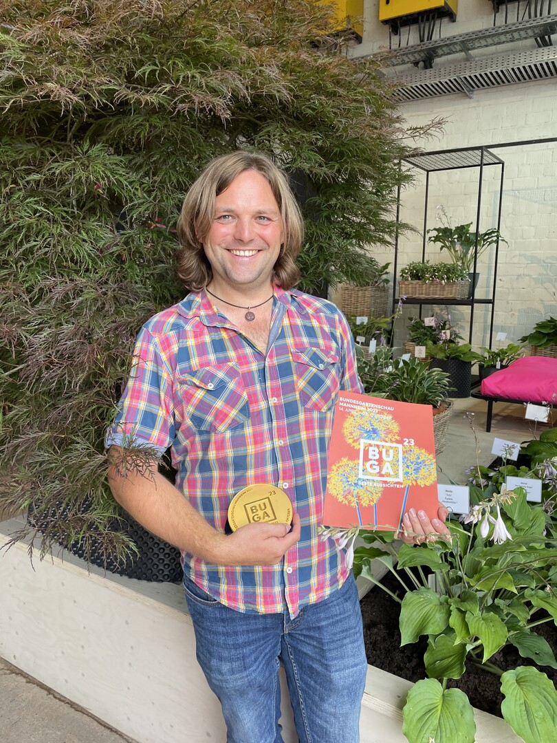 Portrt Christian Nielsen (mit der Groen Goldmedaille der DBG)