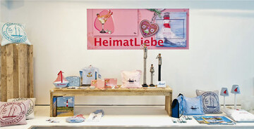 Auf der early bird stand bei vielen
Wohnaccessoires das Thema Heimatliebe
im Vordergrund: der Alpenstil mit
Hirsch- und Edelweimotiven, aber auch
Stadtteile wie St. Pauli in Hamburg.